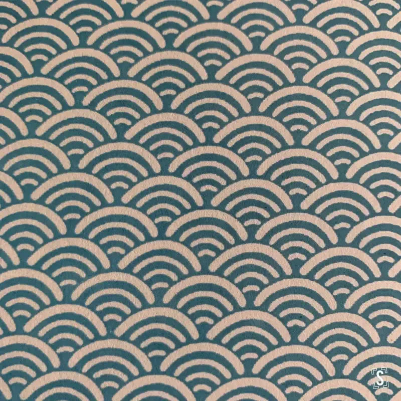 Repeating teal and beige semicircles in a Japanese Chiyogami hand-designed print