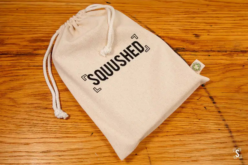 SQUUSHED Logo - Organic Cotton Drawstring Bag - 220gsm - Natural - 21cm x 30cm - Packaging