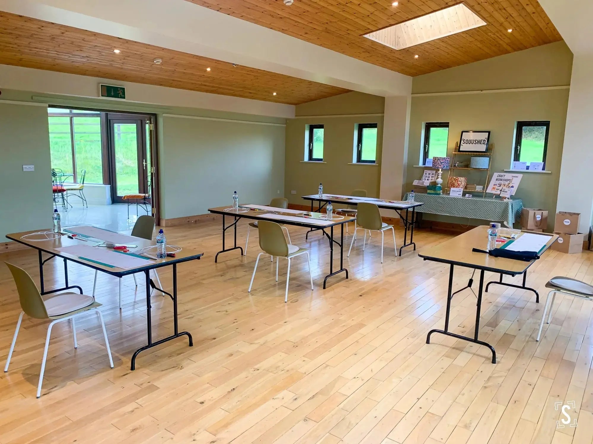 tables chairs and materials set up for a lampshade workshop