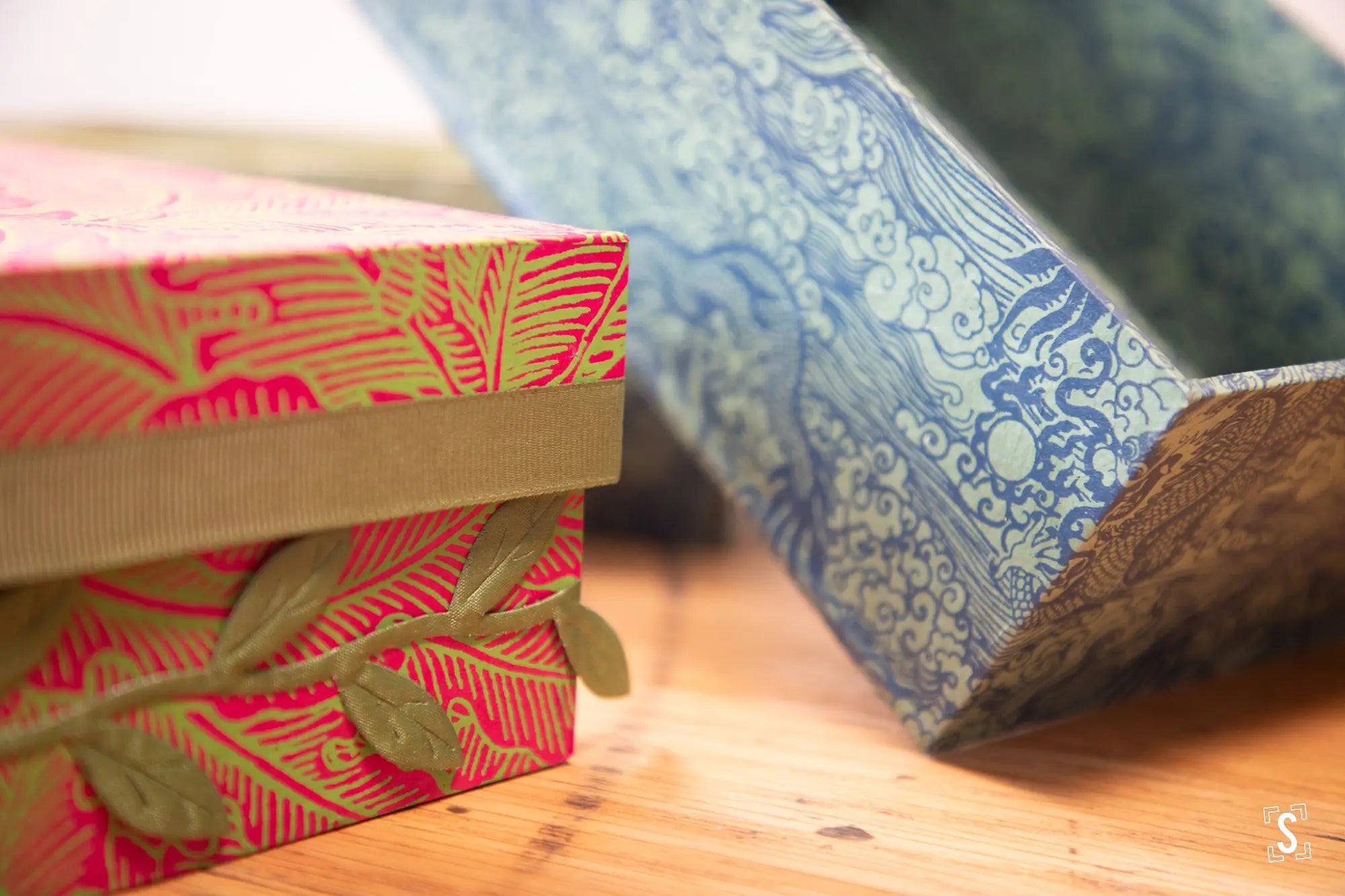 Decorative gift boxes with patterned wrapping paper.