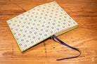 Decorative notebook with patterned cover and ribbon bookmark for Bookbinding Workshop