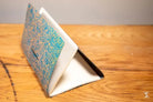 Triangular stand with colorful pattern for Bookbinding Workshop Chain Stitch projects