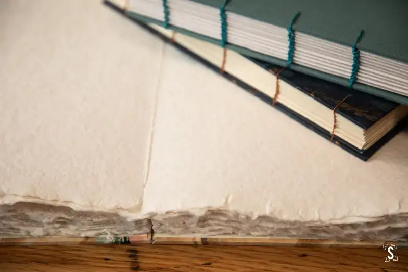 Hand-bound book showcasing exposed stitching from the Coptic Stitch workshop