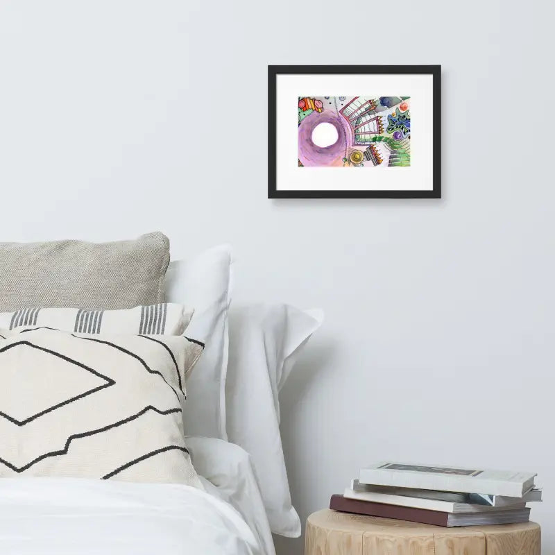 Framed Poster Dreamscape on ayous wood frame beside a bed with a white pillow