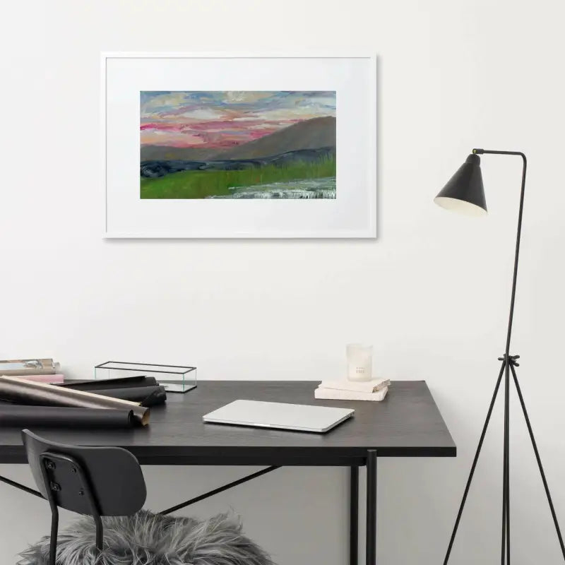 Framed Poster of a Pink Sky Landscape above a desk in a stylish interior setting