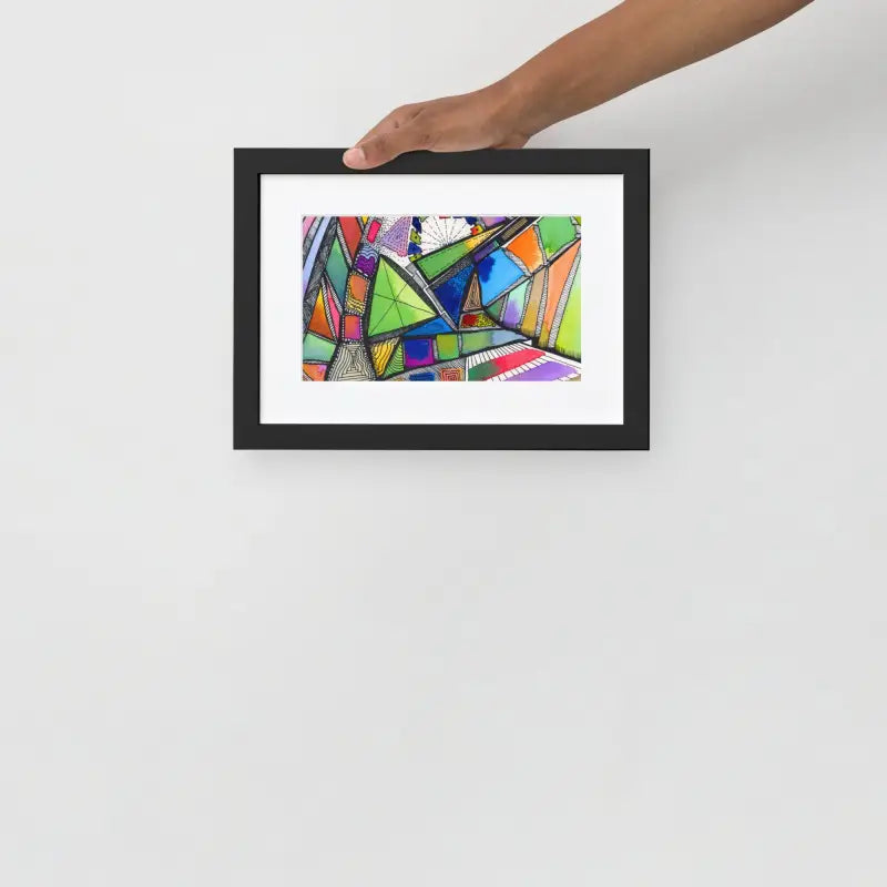 Hand holding a Framed Poster | Polygon showcasing a colorful abstract painting on matte paper