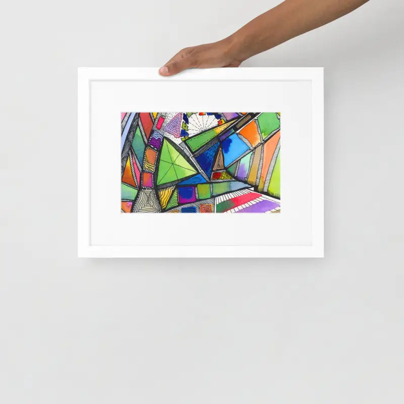 Hand holding a Framed Poster | Polygon featuring a colorful abstract painting on matte paper