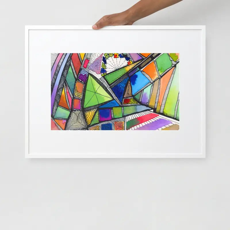 Hand holding a Framed Poster featuring a colorful abstract painting on matte paper