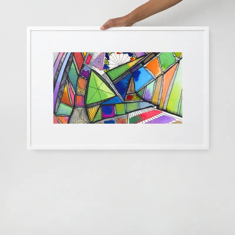 Person holding a Framed Poster of a hand designed colorful abstract painting on matte paper