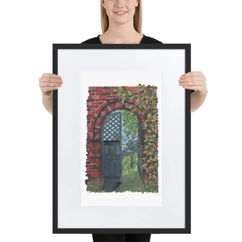 A woman showcases a vibrant colours Framed Poster featuring a Secret Door on matte paper