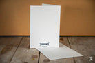 White greeting card with ’sosod’ on it from Greeting Card Pack with Premium Envelopes | Behind the Secret Door