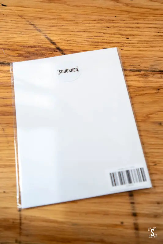 White notebook with barcode on back cover, crafted from premium 150gsm feltmark