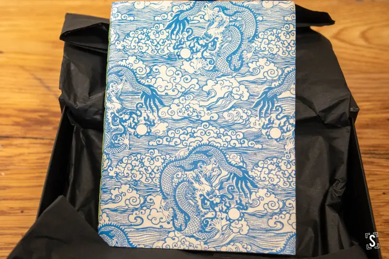 Hand designed Handmade Book featuring a blue and white dragon pattern print cover