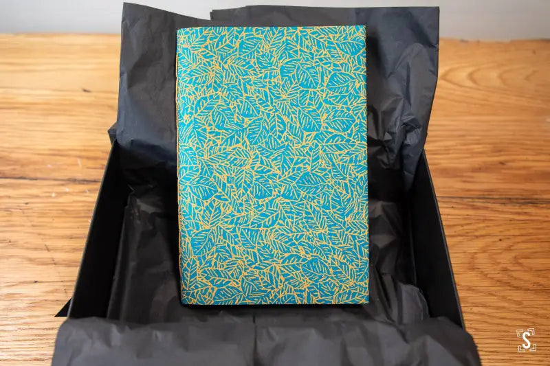 Turquoise notebook with gold leaf pattern, hand designed art in Nepalese Lokta