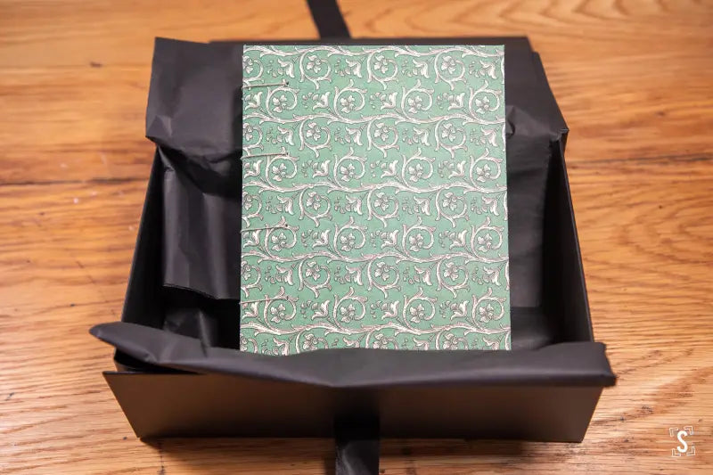 Green patterned notebook in black gift box, hand designed with Italian Carta Varese prints