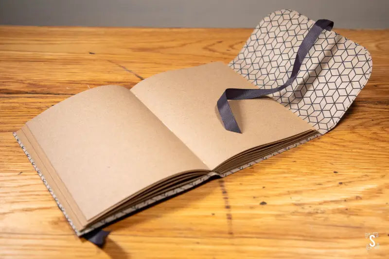 Handmade Book with Long Stitch in Nepalese Lokta featuring a Ribbon Closure