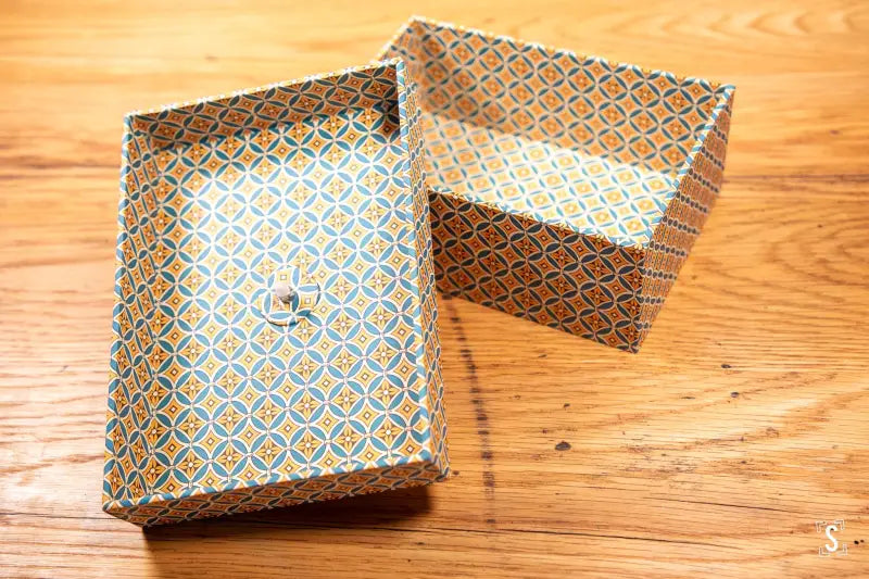 Handmade Keepsake Box featuring a decorative blue and gold patterned design