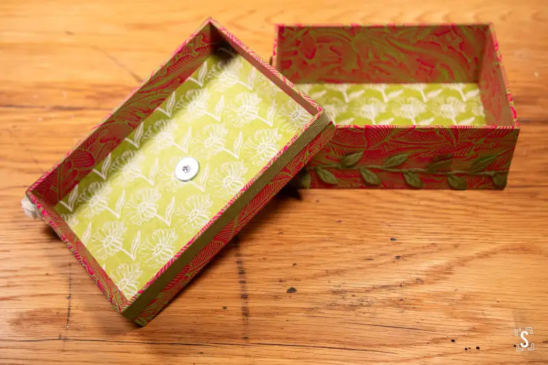 Handmade Keepsake Box featuring a patterned interior lining and separate lid in pink and green