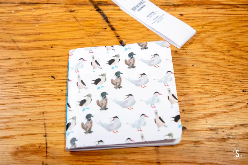 Handmade Notebook with a Duck Pattern Cover showcasing Chain Stitch Binding