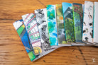 Colorful bookmarks with artistic designs for Handmade Notebook featuring chain stitch binding