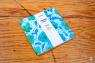 Colorful blue and green ceramic coaster for Handmade Notebook with Chain Stitch binding