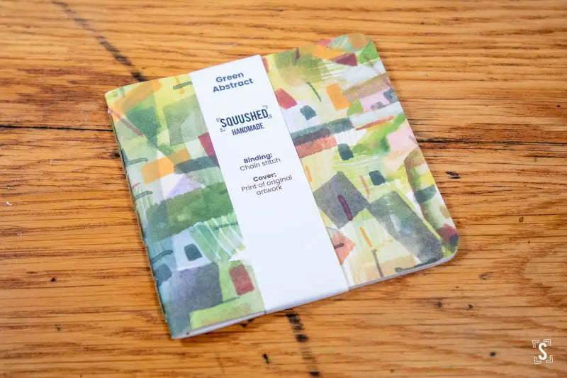 Colorful fabric square with abstract geometric pattern for Handmade Notebook with Chain Stitch binding