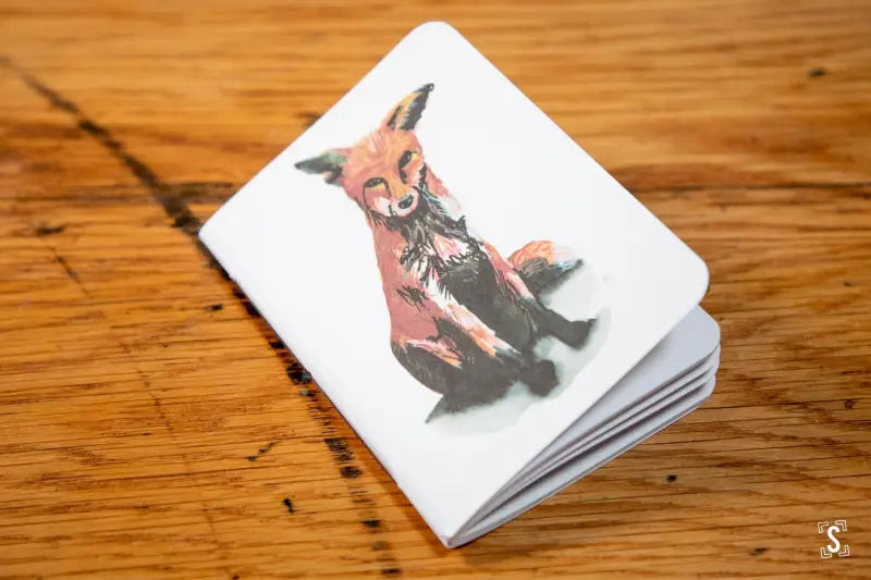 Handmade pocket notebook with fox illustration on cover, ideal for creative notes