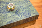 Decorative Handmade Keepsake Box featuring an ornate blue patterned lid and knob