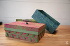 Decorative keepsake boxes in pink, green, and teal for Keepsake Box Making Workshop