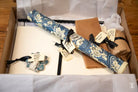 Decorative blue and white floral parchment paper for Coptic stitch bookbinding materials