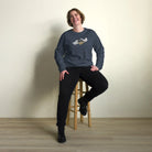 Organic Cotton Sweatshirt featuring a woman sitting on a stool