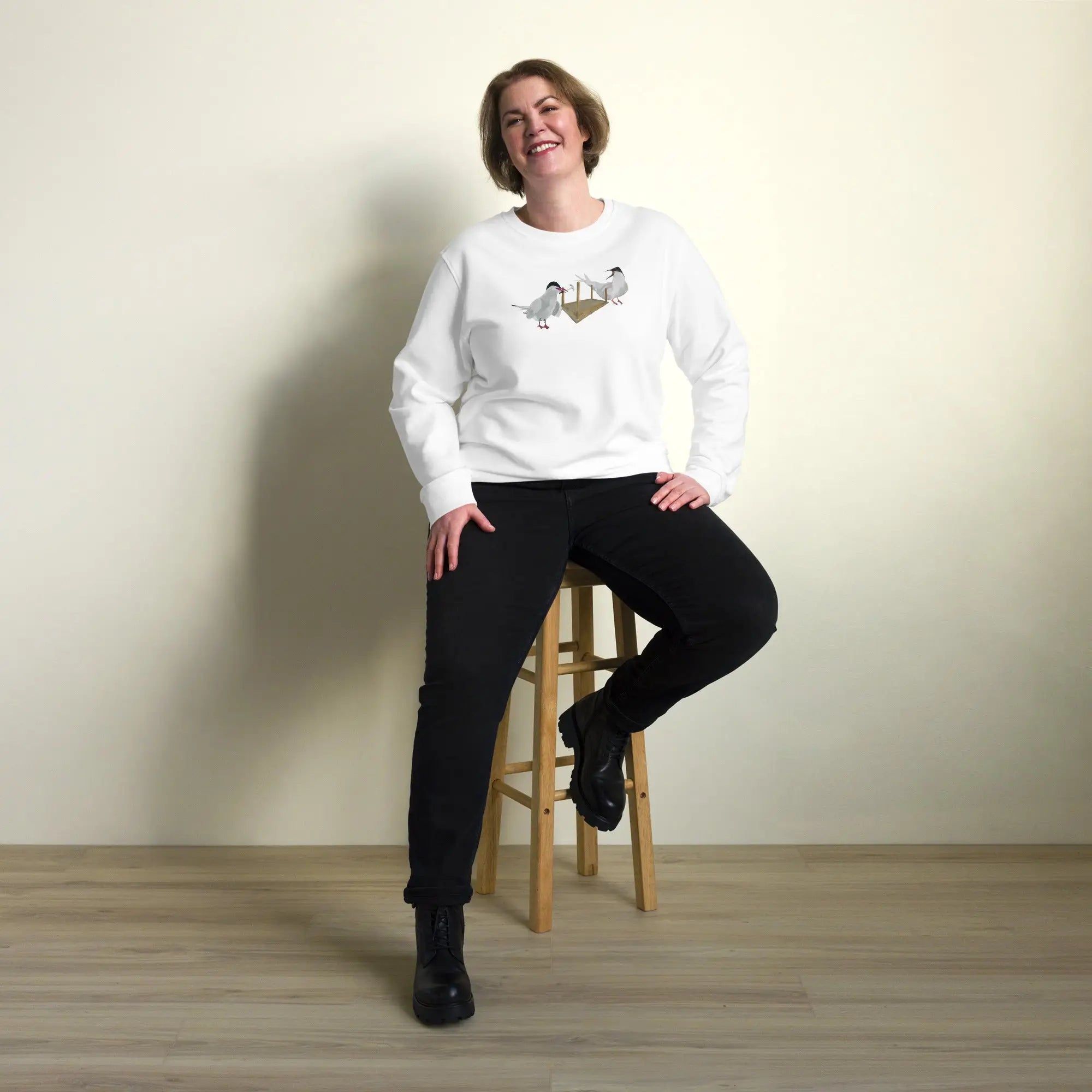 Organic Cotton Sweatshirt - Woman in White Sweatshirt sitting on stool