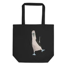 Black organic cotton tote bag featuring a white bird design, named Booby