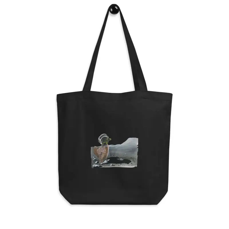 Black organic cotton tote bag featuring a bird design from Loonar Landing