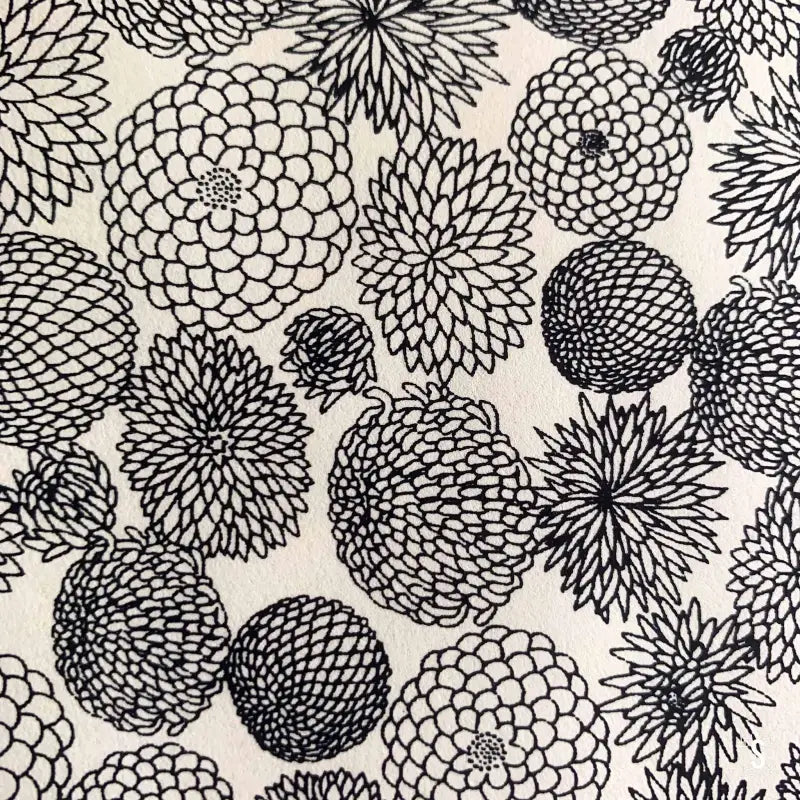 Floral pattern with stylized blooms in black and white on Japanese Chiyogami prints