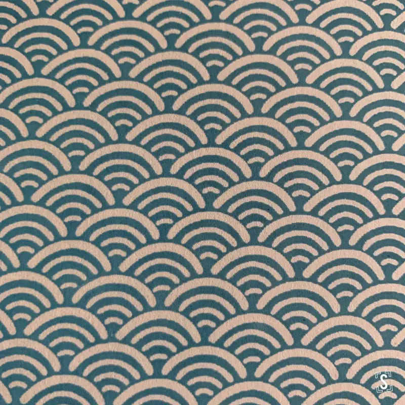 Repeating teal and beige semicircles in a Japanese Chiyogami hand-designed print