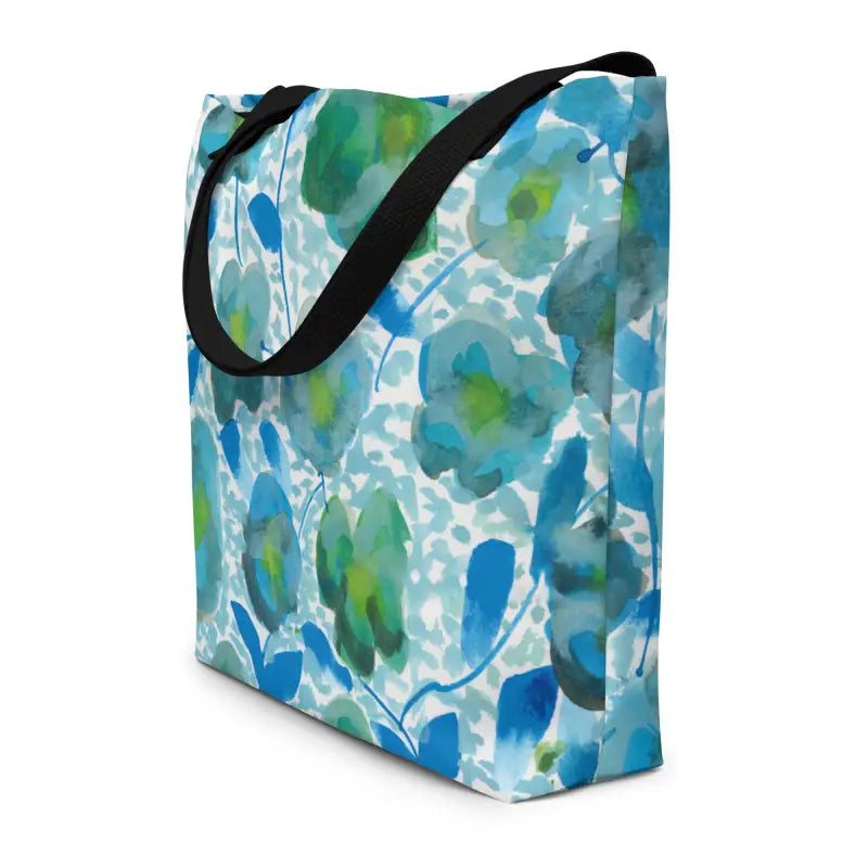 Hand designed tote bag featuring a large blue and green watercolor floral pattern