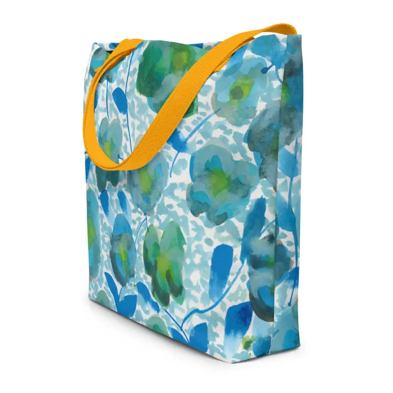 Tote bag with blue and green floral watercolor pattern and yellow handles, hand designed prints