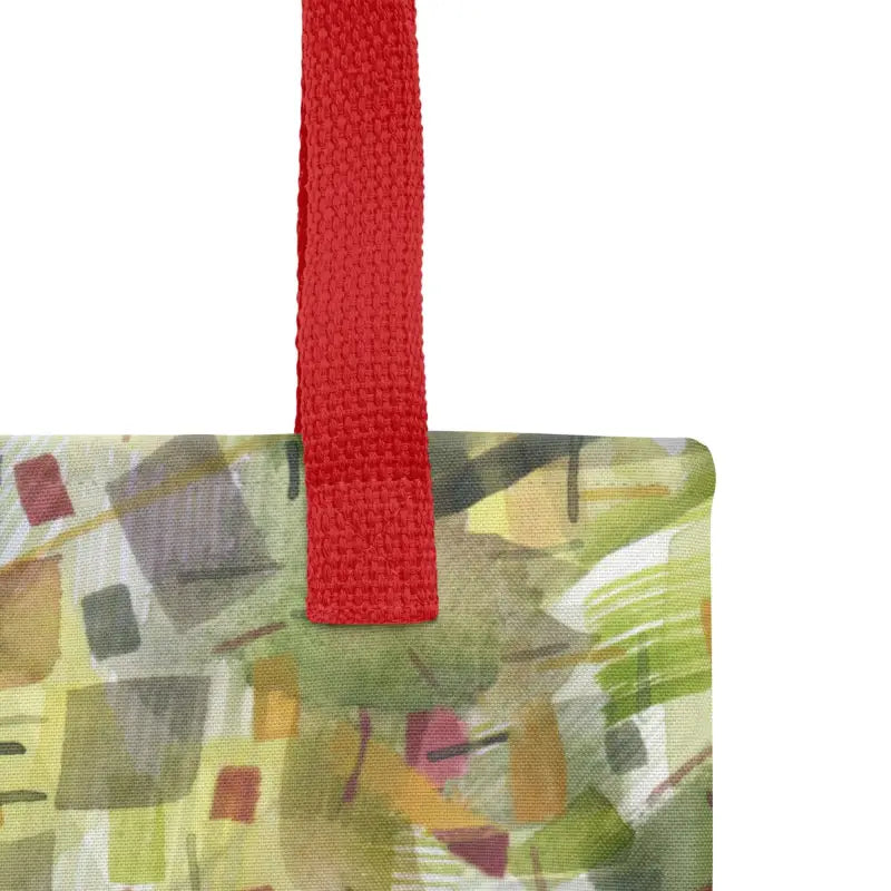 Hand designed tote bag featuring a colorful green abstract painting on a white background