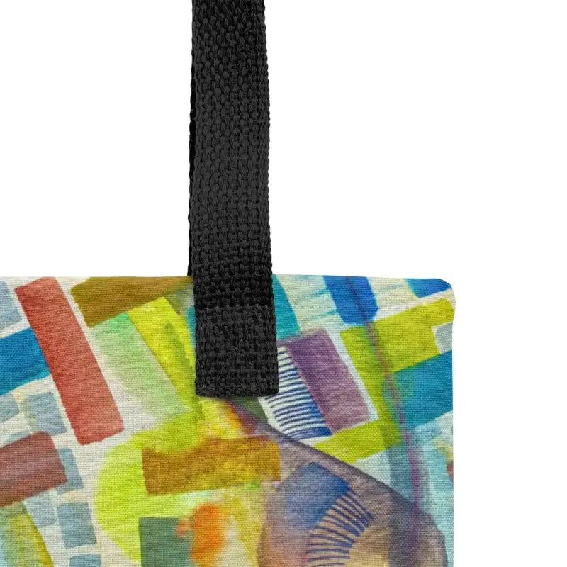 Colorful hand designed tote bag featuring vibrant abstract artwork